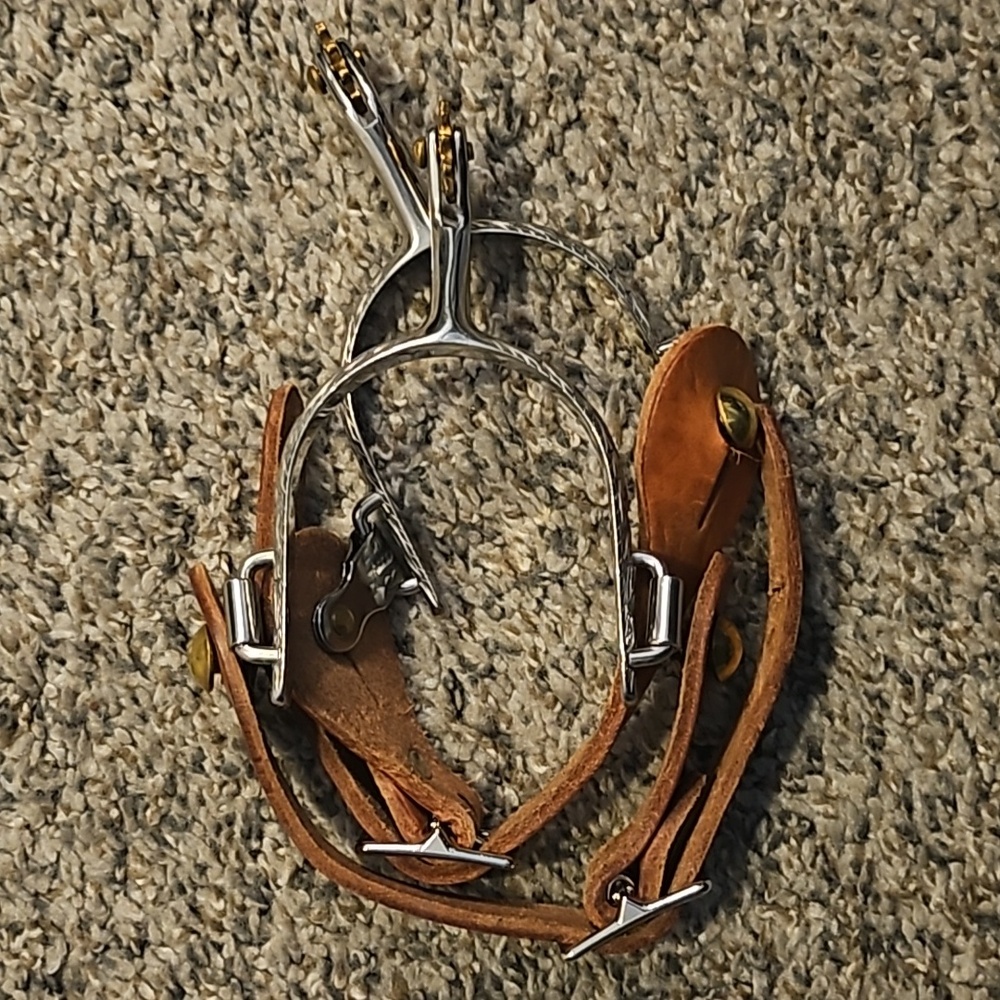 Spurs with straps